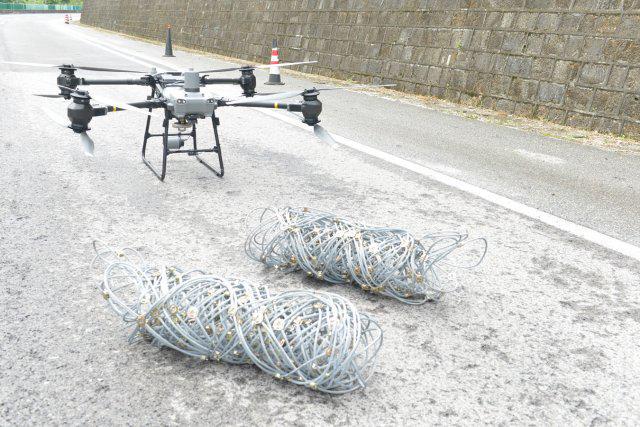 开云 开云体育官网厉害!杭瑞高速大保段危岩体应急处治工程首次引入无人机施工(图2) 开云 开云体育官网厉害!杭瑞高速大保段危岩体应急处治工程首次引入无人机施工(图2)